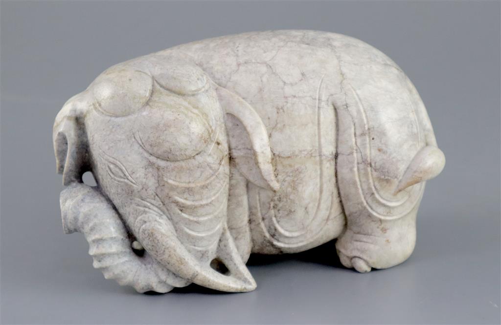 A Chinese burnt jade figure of an elephant, 15.5cm long